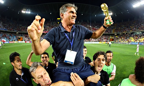 Carlos Quieroz is carried on the shoulders of his Iran players after they qualified for the World Cup 2014. Photograph: Amin M. Jamali/Getty Images